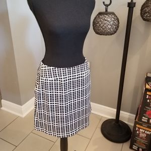 Womens Tail golf skort size small.  Black and white.  Gently worn.  Like new